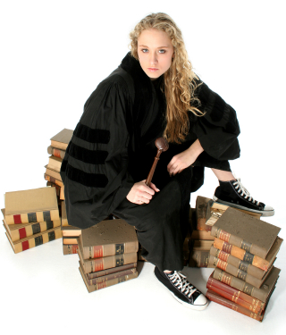 Young Blonde Judge Sitting on 70 Year Old Law Books